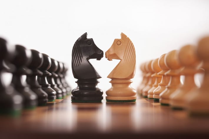 Chess pieces visualzing the importance of strategically placed applications 